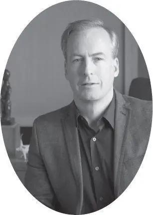 ABOUT THE AUTHOR Bob Odenkirk is stuck under a cat holding someones wine - фото 33