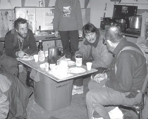 In the makeshift kitchen in the Unalakleet checkpoint during the 1994 race - фото 108