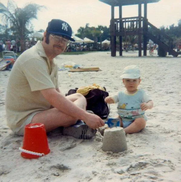 Playing on a beach in Florida in 1988 with my son Matthew who was one year - фото 10