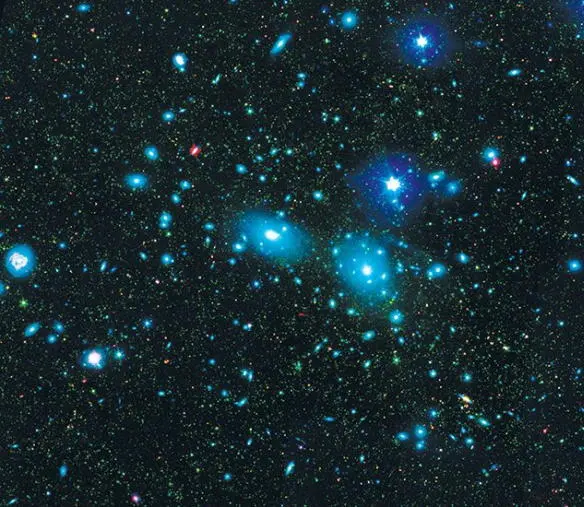 Fig 242 The Coma cluster of galaxies as seen through a large telescope This - фото 200