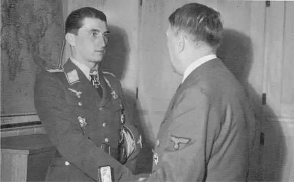 Hauptmann later Major Walter Nowotny receiving the Diamonds to his Knights - фото 72
