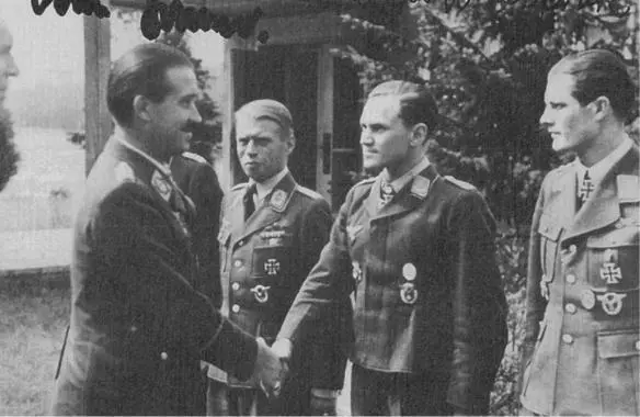 Adolf Galland welcoming the new recruits into JV44 while shaking Krupinskis - фото 74