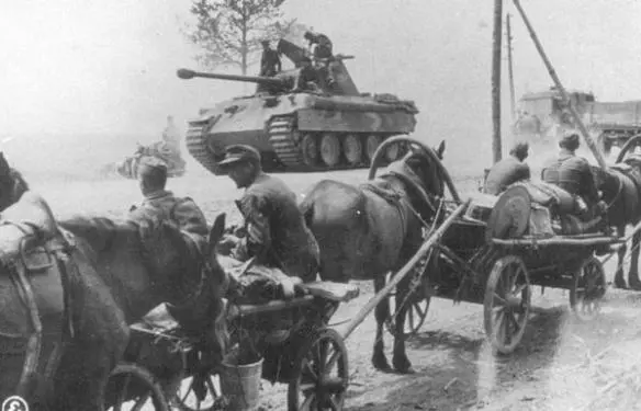 A Panther Sd kFz 171 ausf A passes an infantry unit on the march toward the - фото 22