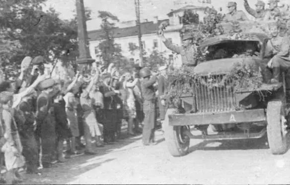 A Polish Studebaker US6 with soldiers from the 1 st Army in liberated - фото 52