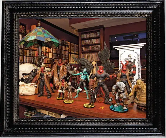 A vinyl toy from del Toros childhood stands guard over mementos from his past - фото 50