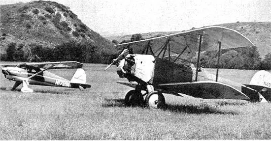 The Luscombe and the biplane in earlier days as we were practicing landings in - фото 47