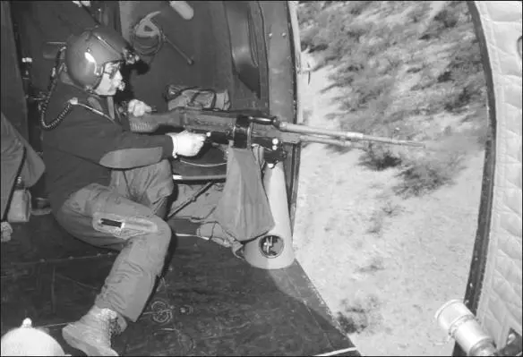 WO Ken van Straaten the SAAFs most decorated NCO mans an MAG in the door of - фото 30