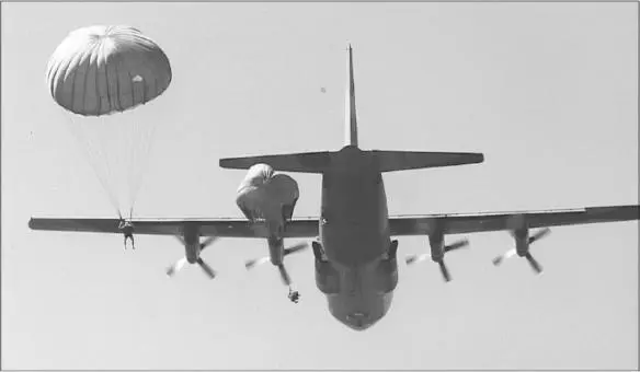 Paratroopers jumping from the side doors of a C130 Hercules Impala pilots - фото 42