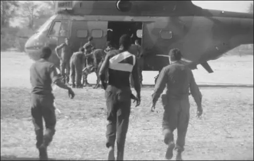 A wounded capture is led away toward an awaiting Puma Photo courtesy Cameron - фото 59