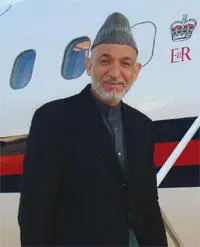 5 President Hamid Karzai pictured on a trip to the UK was not shy of - фото 86
