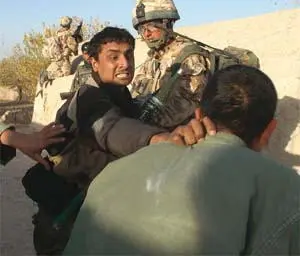 35 An Afghan soldier confronts a Taliban prisoner 36 Afghan soldiers - фото 111