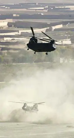 46 Chinook helicopters land in the wadi above to recover wounded and - фото 122