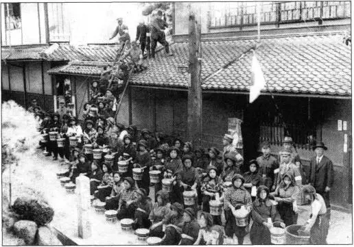 Fire drill to prepare for air raids A few weeks before Hiroshima had welcomed - фото 56