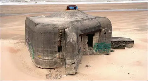 Coastal erosion has left many bunkers stranded on the beach like this H120 - фото 29