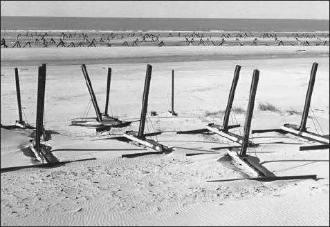 A fairly typical example of beach obstacles in the Fifteenth Army sector east - фото 31