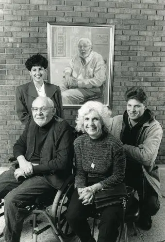 Stanley and Joan Elkin pose with their children in front of an oil painting of - фото 18