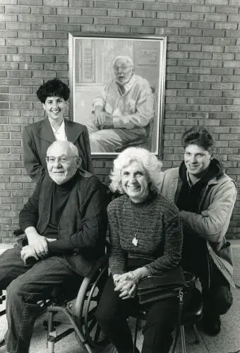 Stanley and Joan Elkin pose with their children in front of an oil painting of - фото 10