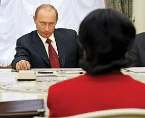 Sitting across the table from Russian President Vladimir Putin AFPGetty - фото 89