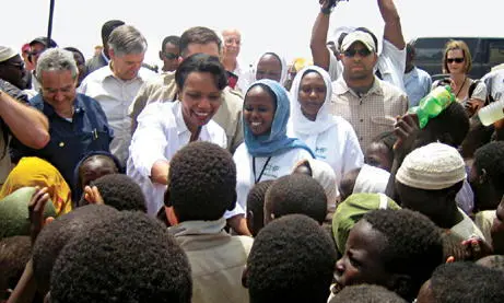 Greeting children at the Abu Shouk refugee camp in Darfur where I also met - фото 90