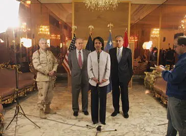 Addressing the press at the US Embassy in Baghdad during a visit to Iraq with - фото 106
