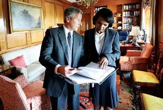 Reviewing a document with my chief of staff Brian Gunderson in my inner office - фото 126