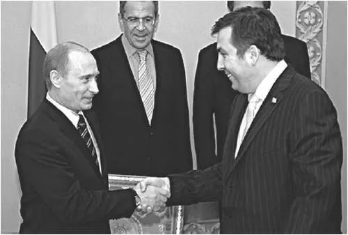 All smiles at Putins first meeting in 2004 with the Westernoriented Georgian - фото 17