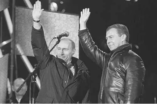Putin and Dmitry Medvedev celebrate the latters election as president in May - фото 29