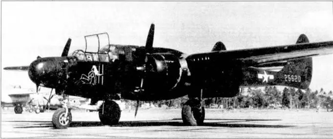 Снимок истребителя P61A сделан на Тихом океане в 1945 г на борту фюзеляжа - фото 97