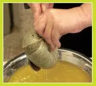 Twist the cheesecloth bundle and press with the back of a spoon To recover the - фото 31