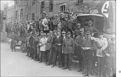 The Brownshirts in 1926 were soon a rising force After Hitler took power - фото 23