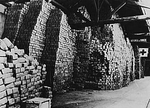 Piles of food packages at the International Red Cross warehouse in Geneva in a - фото 20