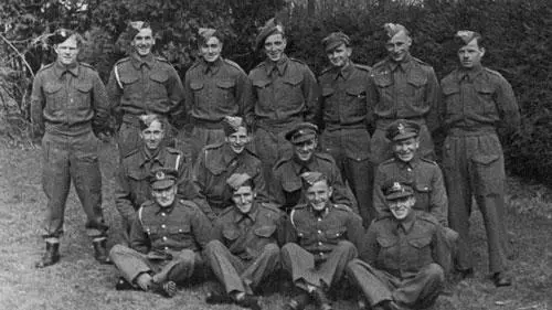 Group camp photograph 1941 GB 1373 Charles stands third from right in the - фото 28