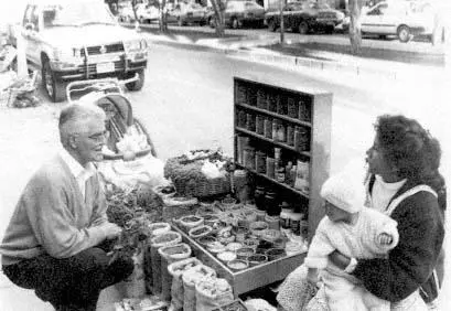 Figure 12 Jaime Zalles talking to a herbal vendor in Tarija Bolivia about - фото 12