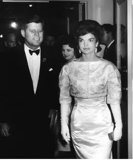Jacqueline Bouvier Kennedy pictured here at a 1962 inaugural party brought - фото 17