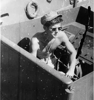 Lieutenant John Fitzgerald Kennedy in the cockpit of PT109 Photographer - фото 12