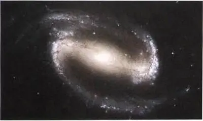 Рис 20 У многих спиральных галактик сеть перемычка бар от концов которого - фото 280