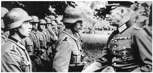 Field Marshal Gerd von Rundstedt awards Iron Cross decorations to German - фото 73