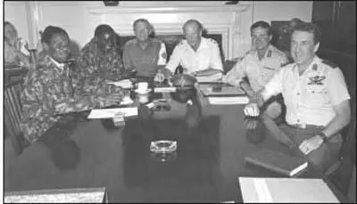 In this photograph taken at the start of a Ceasefire Committee meeting Dumiso - фото 792