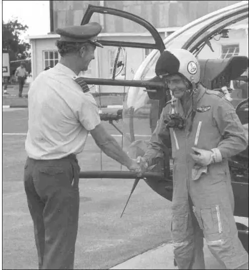 In much happier times Ian receives congratulations from Group Captain Mick - фото 813