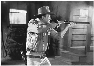 You cant make a Western without a Winchester Above John Wayne takes aim in - фото 41