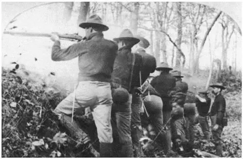 Philippines 1899 Kansas volunteers firing from trench Library of Congress - фото 59
