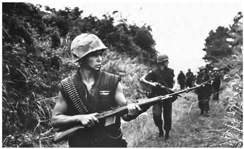 An American on patrol in Vietnam with an M14 National Archives Being SEALs - фото 83