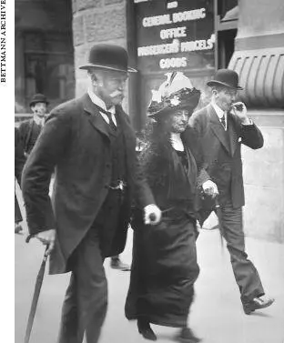 Bruce smoking and Florence Ismay with Harold Sanderson walking to the - фото 12