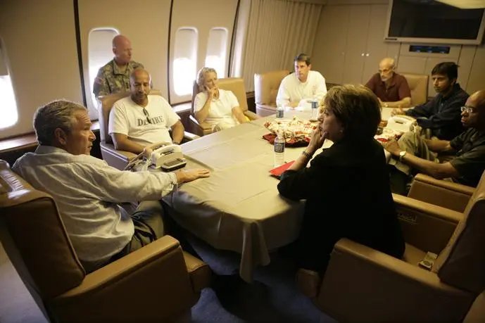 Aboard Air Force One at the New Orleans airport Clockwise at table Ray - фото 300