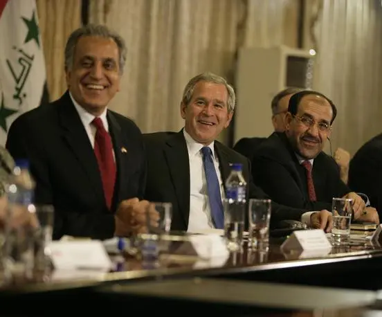 With Zal Khalilzad left and Nouri al Maliki White HouseEric Draper A - фото 358