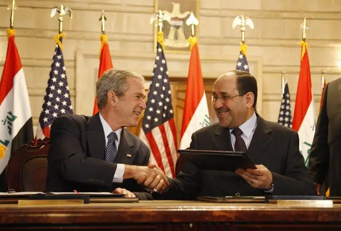 Signing the SOFA and SFA agreements with Nouri al Maliki White HouseEric - фото 386