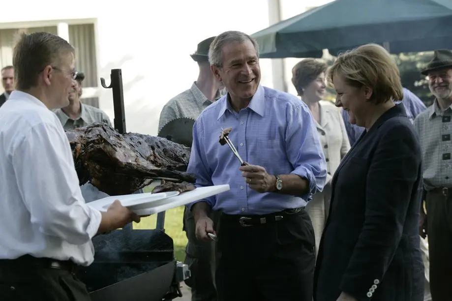 With Angela Merkel at a pig roast near her hometown in former East Germany - фото 405