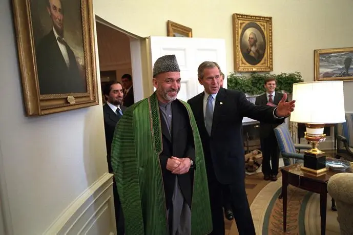 In the Oval Office with Hamid Karzai White HouseEric Draper On behalf of me - фото 198