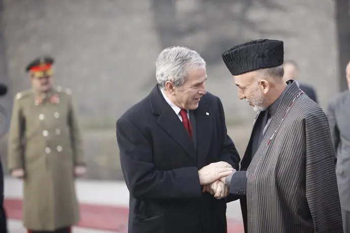 With Karzai on the last foreign trip of my presidency White HouseEric Draper - фото 211