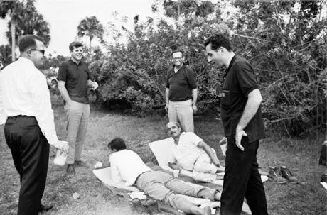 President Kennedy jokes with Clint Hill during fiftymile hike By this time - фото 65